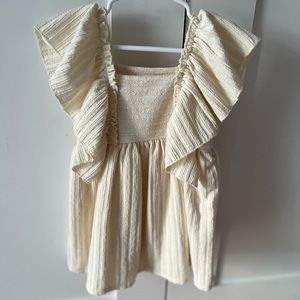 Cream ruffled dress